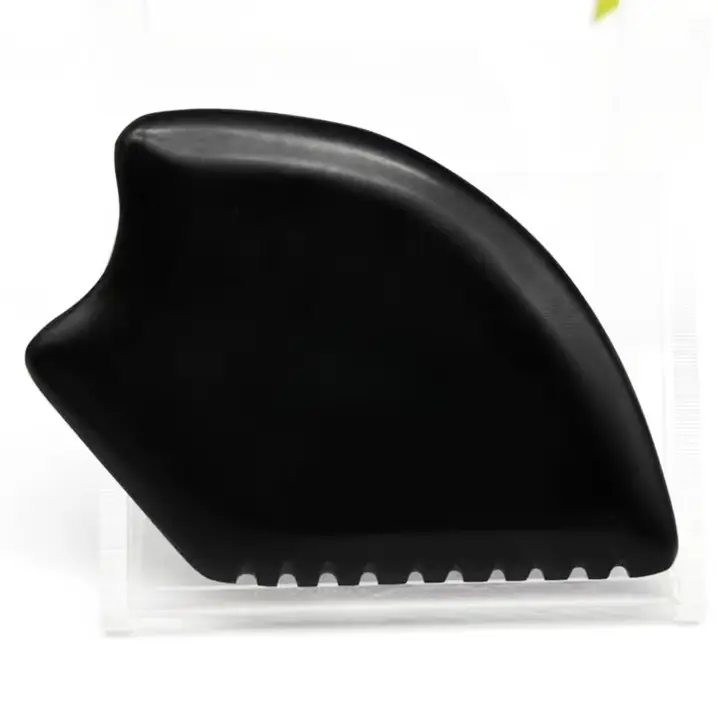 Gua Sha musta kivi